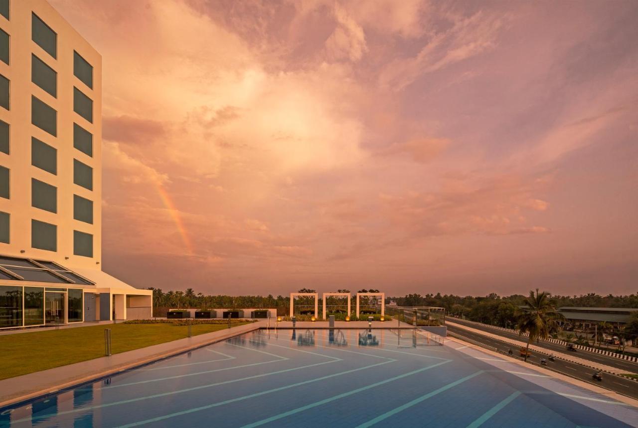 O By Tamara, Trivandrum Thiruvananthapuram Ngoại thất bức ảnh The pool at the Infosys Mysuru campus